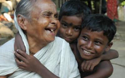 A grandmother laughs with her two grandsons in Howrah, India. © 2012 Susanta, Courtesy of Photoshare
